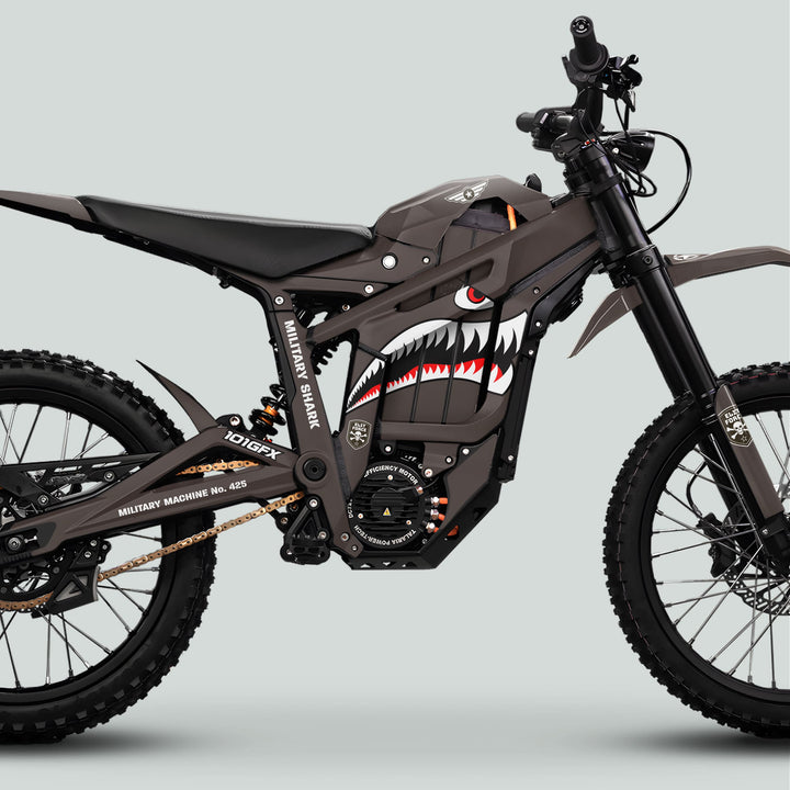 Talaria Sting MX5 PRO Graphics Kit MILITARY SHARK Earth Decals on military-themed off-road motorcycle, featuring shark-mouth graphic and stenciled markings for a bold, adventurous look.