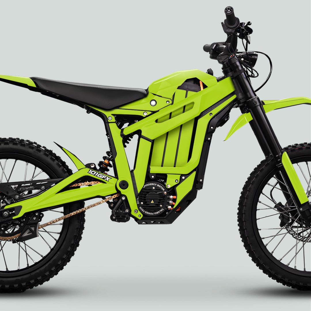Talaria Sting MX5 PRO Graphics Kit SOLID COLOR Green Decals on an off-road electric dirt bike with knobby tires and long-travel suspension.