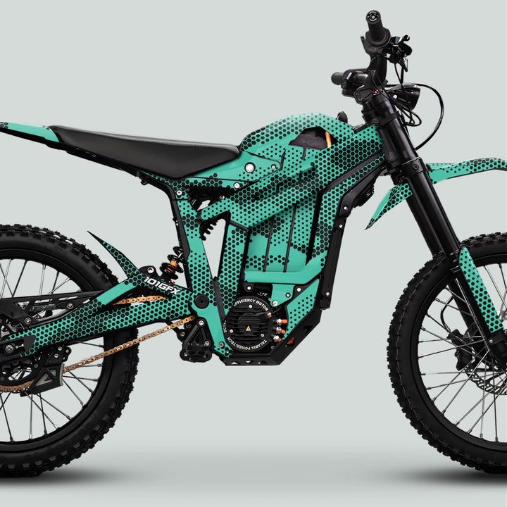 Talaria Sting MX5 PRO Graphics Kit HEXOCAM MINT enhances the electric dirt bike with teal-green, hex-dot patterned bodywork, durable for off-road adventures.