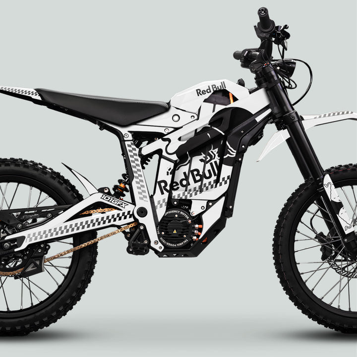 Talaria Sting MX5 PRO Graphics Kit RBULL MONO features a sleek Red Bull-branded electric dirt bike with knobby tires, long-travel suspension, and a glossy, stylish decal finish.
