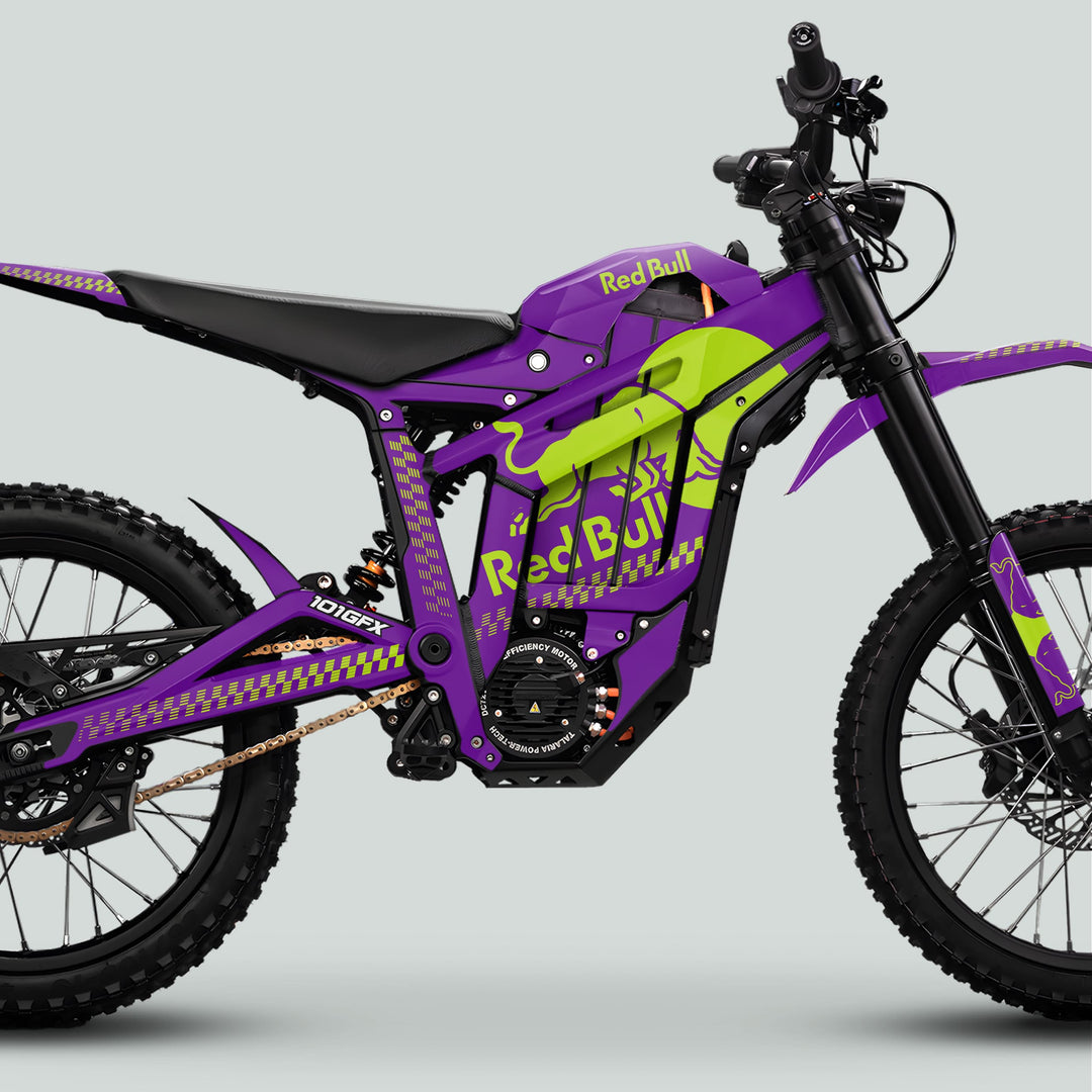 Talaria Sting MX5 PRO Graphics Kit RBULL MONO with bold purple and lime-green decals on an electric off-road motorcycle, featuring Red Bull branding and durable materials.