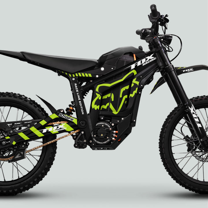 Talaria Sting MX5 PRO Graphics Kit with FOX RACELINE decals on an off-road electric motorcycle, featuring black and neon-green styling, enhancing its motocross appearance.