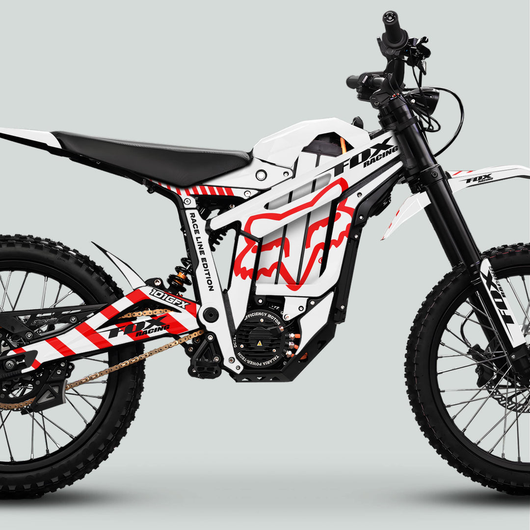Talaria Sting MX5 PRO Graphics Kit FOX RACELINE White Red Decals on an e-dirtbike with Fox Racing branding, showcasing durable, stylish design for off-road adventures.