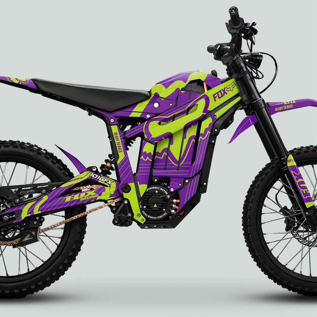 Talaria Sting MX5 PRO Graphics Kit FOX STRIPES on a Fox-branded electric motocross bike, featuring durable, stylish purple and lime-green decals.
