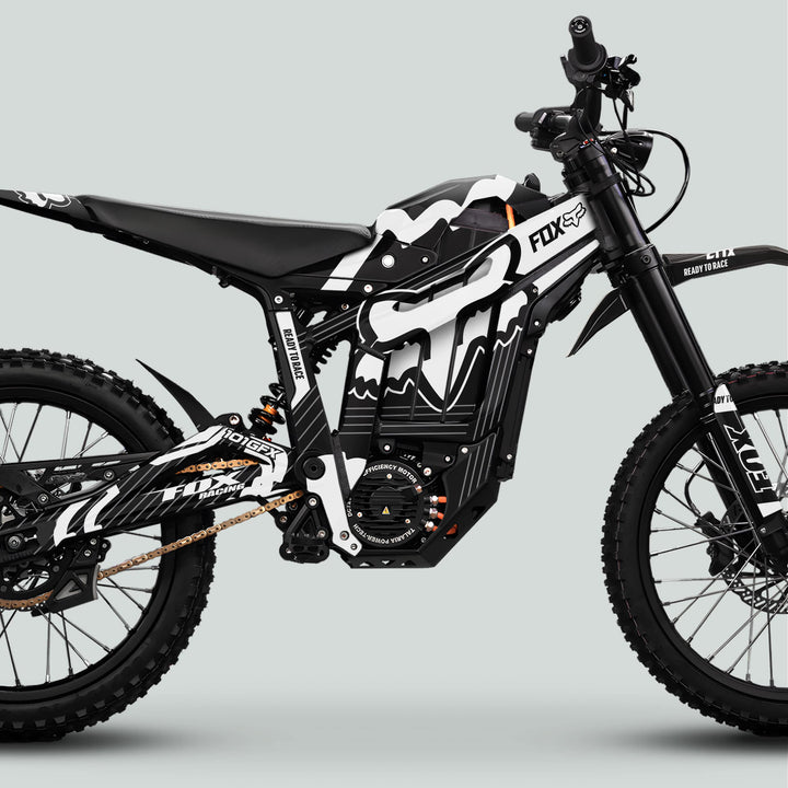 Side-profile of Talaria Sting MX5 PRO Graphics Kit FOX STRIPES, showcasing knobby tires, heavy-duty suspension, and sleek READY TO RACE branding on motocross E-bike.
