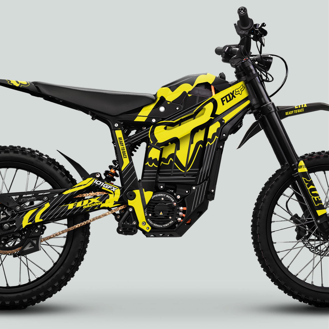 Talaria Sting MX5 PRO Graphics Kit: Black and yellow FOX STRIPES decals adorn the electric off-road bike, enhancing style with durable, full-coverage design.