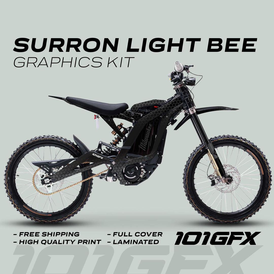 Surron Light Bee X Graphics Kit HONEYCOMB Black Grey on bike, featuring a black honeycomb wrap. Highlights include free shipping, high-quality print, full cover, and laminated finish.