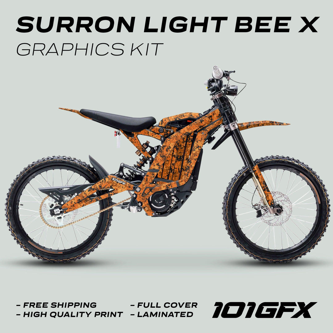 Surron Light Bee X Graphics Kit SQUARE TEK Orange on electric dirt-bike, features orange digital-camo decals covering frame, fork legs, swingarm, fenders, with overlaid promotional text.