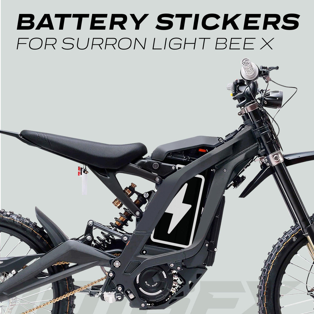 Surron Light Bee X Battery Stickers ICON BOLT displayed on a bike, featuring a stylized lightning-bolt design on the battery compartment for a personalized look.