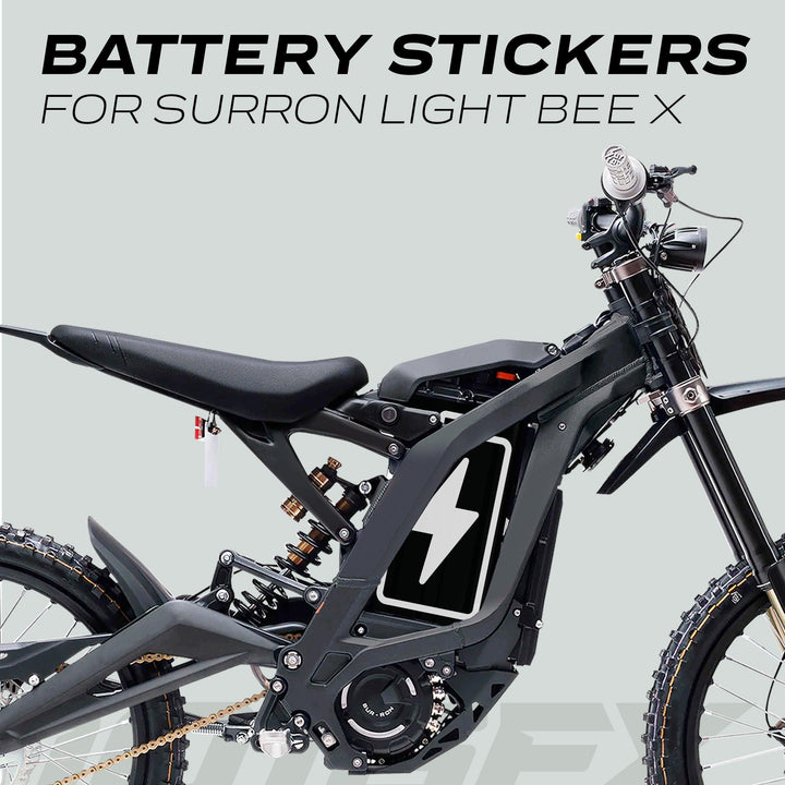 Surron Light Bee X Battery Stickers ICON BOLT displayed on a bike, featuring a stylized lightning-bolt design on the battery compartment for a personalized look.