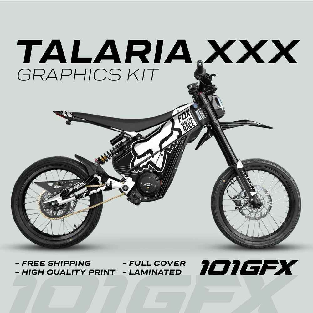 Talaria XXX Graphics Kit FOX STRIPES Black White on electric motocross bike, showcasing black-and-white livery, free shipping, high-quality print, full coverage, laminated, 101GFX logo.