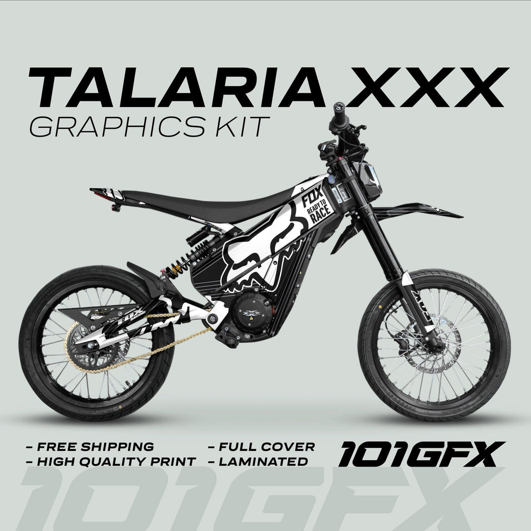 Talaria XXX Graphics Kit FOX STRIPES Black White on electric motocross bike, showcasing black-and-white livery, free shipping, high-quality print, full coverage, laminated, 101GFX logo.