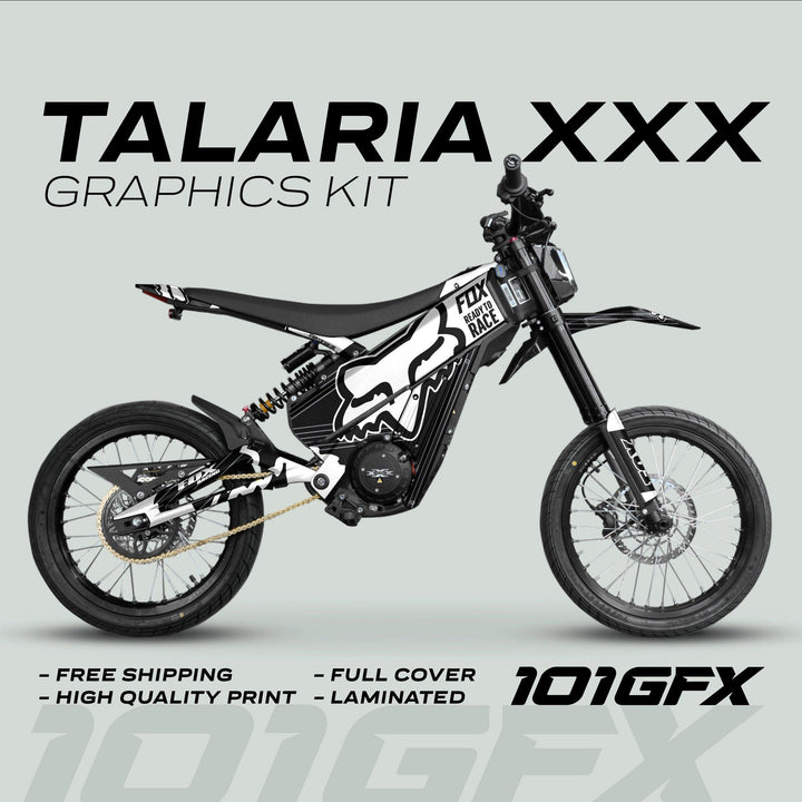 Talaria XXX Graphics Kit FOX STRIPES Black White on electric motocross bike, showcasing black-and-white livery, free shipping, high-quality print, full coverage, laminated, 101GFX logo.