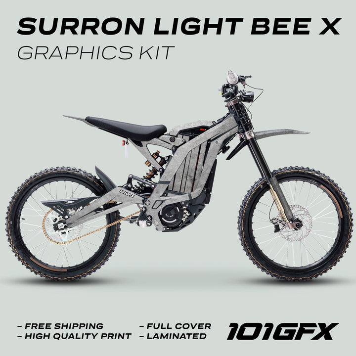 Surron Light Bee X Graphics Kit CONCRETE Grey displayed on bike; features include free shipping, high-quality, full-cover laminated decals for enhanced style and durability.