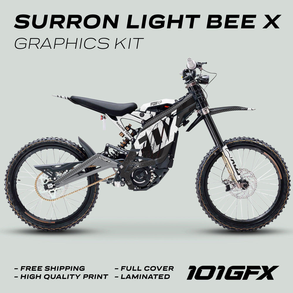 Surron Light Bee X Graphics Kit FOX DUST Black White displayed on a bike, with bold 101 branding, promoting features like free shipping and high-quality print.