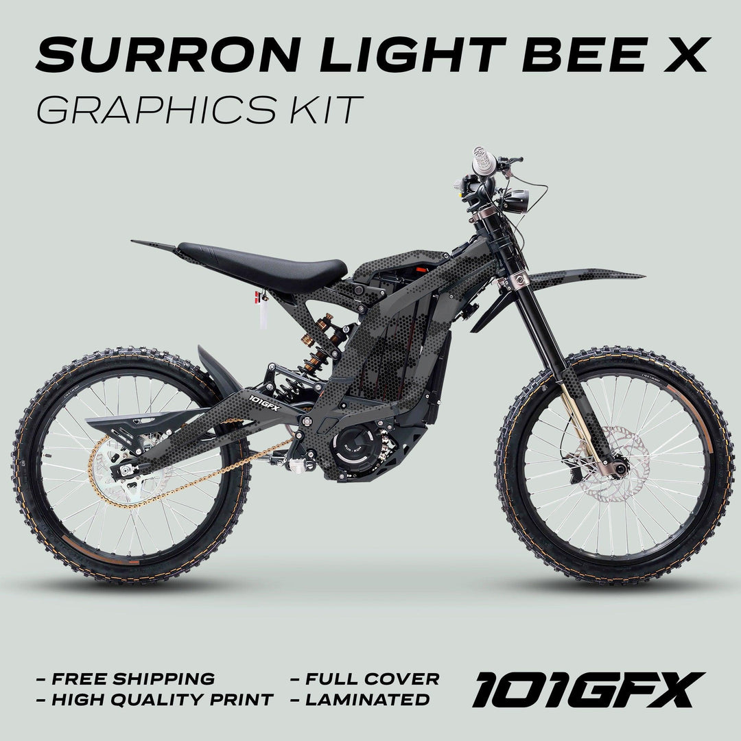 Surron Light Bee X Graphics Kit HEXOCAM Grey showcased on an electric bike, highlighting FREE SHIPPING, HIGH QUALITY PRINT, FULL COVER, and LAMINATED features with 101GFX branding.