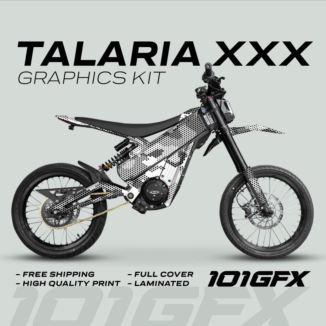 Talaria XXX Graphics Kit HEXOCAM White on an electric off-road bike, showcasing a halftone-style decal wrap with features like Free Shipping and Laminated.