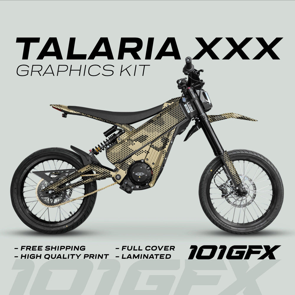 Talaria XXX Graphics Kit HEXOCAM Sande Beige on an electric motocross bike, featuring gold-and-black dotted camo decals with text highlighting its high-quality, laminated design and free shipping offer.