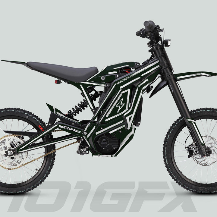 E Ride Pro SS Graphics Kit on an e-dirt bike, featuring a greenish-white design, enhances aesthetics and durability on a dark green tubular frame.
