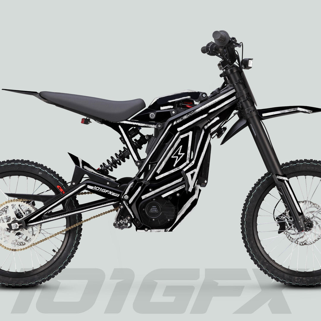 E Ride Pro SS Graphics Kit BRUSH Black White on black electric dirt bike with knobby tires, off-road suspension, and minimal bodywork for enhanced style and durability.