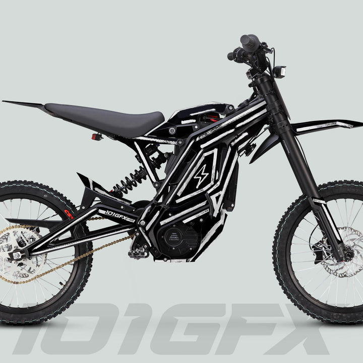 E Ride Pro SS Graphics Kit BRUSH Black White on black electric dirt bike with knobby tires, off-road suspension, and minimal bodywork for enhanced style and durability.