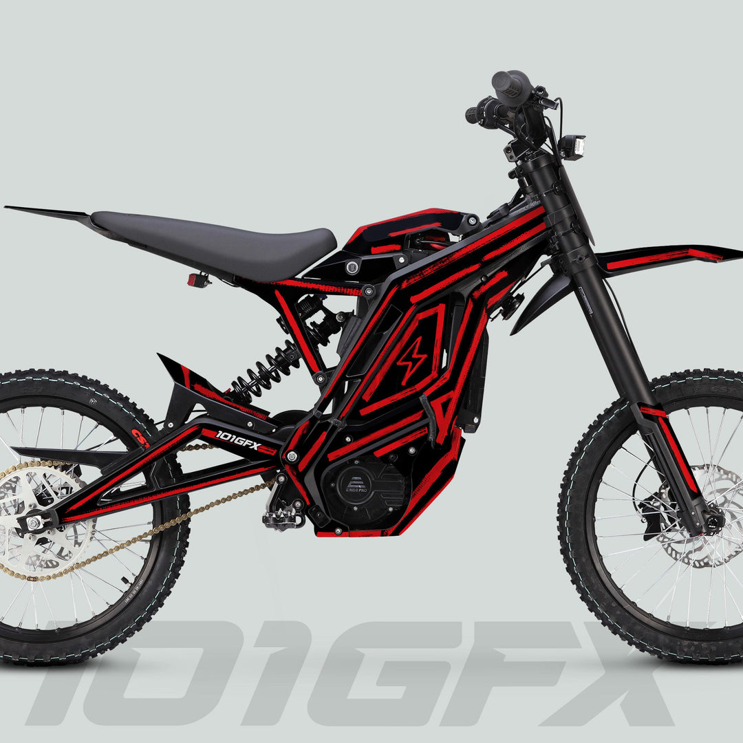 Side-profile of a red-and-black electric dirt bike, showcasing the E Ride Pro SS Graphics Kit BRUSH Black Red on its frame, featuring knobby tires and suspension.