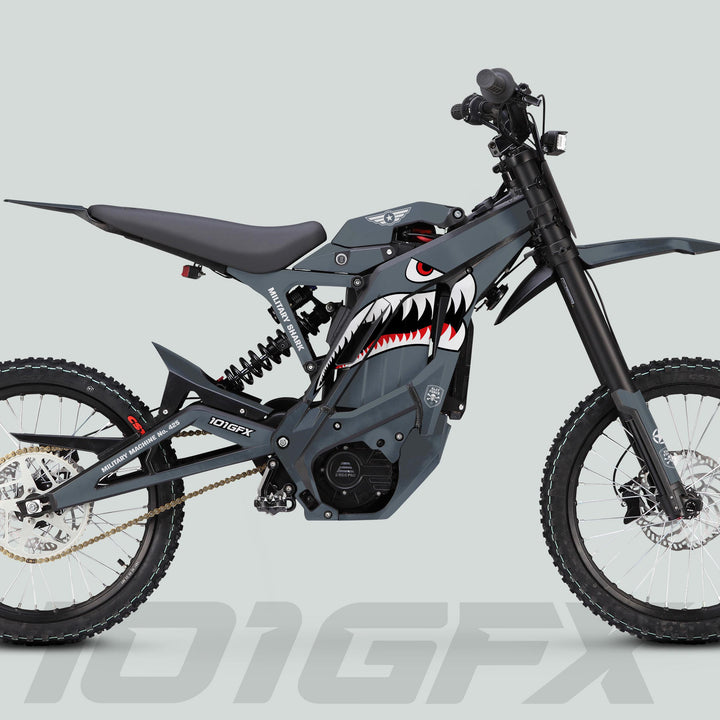 E Ride Pro SS Graphics Kit MILITARY SHARK Grey on motocross bike with full-suspension frame, knobby tires, and shark mouth nose-art.
