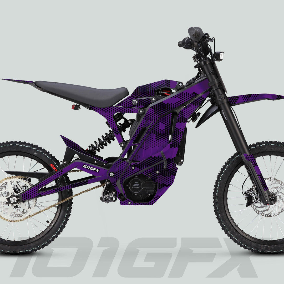 E Ride Pro SS Graphics Kit HEXOCAM PURPLE on an electric dirt-bike, showcasing a vibrant camouflage design with durable materials and precision fit for enhanced aesthetics.