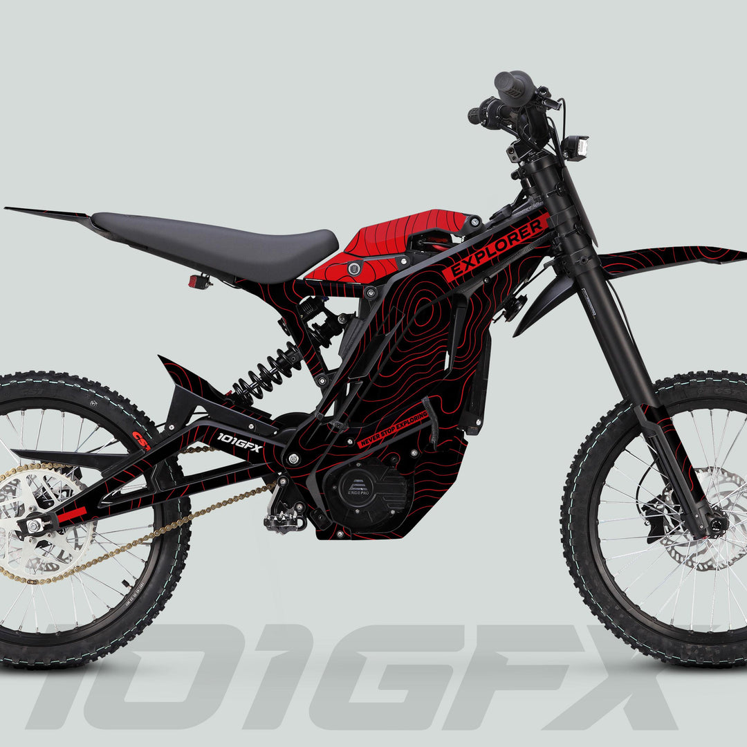 E Ride Pro SS Graphics Kit EXPLORER Black Red on dirt bike, featuring striking black-and-red topographic-line graphics, enhancing aesthetic appeal and providing durability.