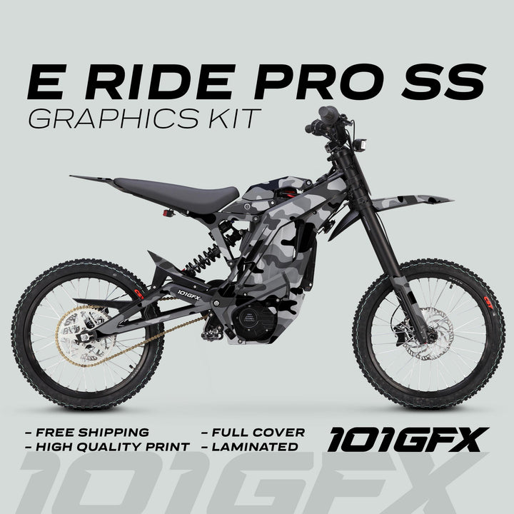 E Ride Pro SS Graphics Kit CAMOUFLAGE SNOW on an off-road motorcycle, featuring gray/black camo design with highlights on durability, easy installation, and unique style.