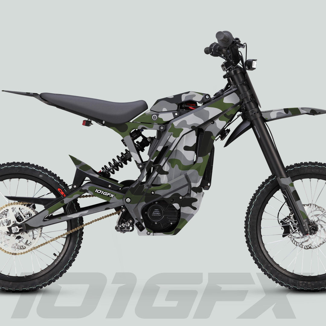 Camouflage-painted electric motorcycle showcasing E Ride Pro SS Graphics Kit CAMOUFLAGE OLISH with knobby tires, suspension, and chain drive, highlighting durable, easy-to-apply decals.