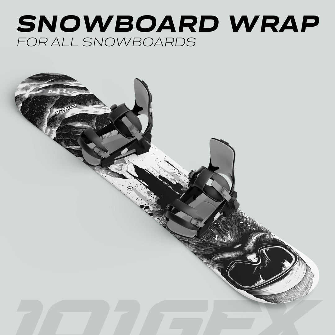 Snowboard Wrap SNOWER WHITE BLACK with black bindings; features a bold ink-splattered design and a wolf graphic, showcasing customizable decal style for snowboards.