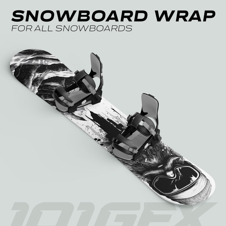 Snowboard Wrap SNOWER WHITE BLACK with black bindings; features a bold ink-splattered design and a wolf graphic, showcasing customizable decal style for snowboards.