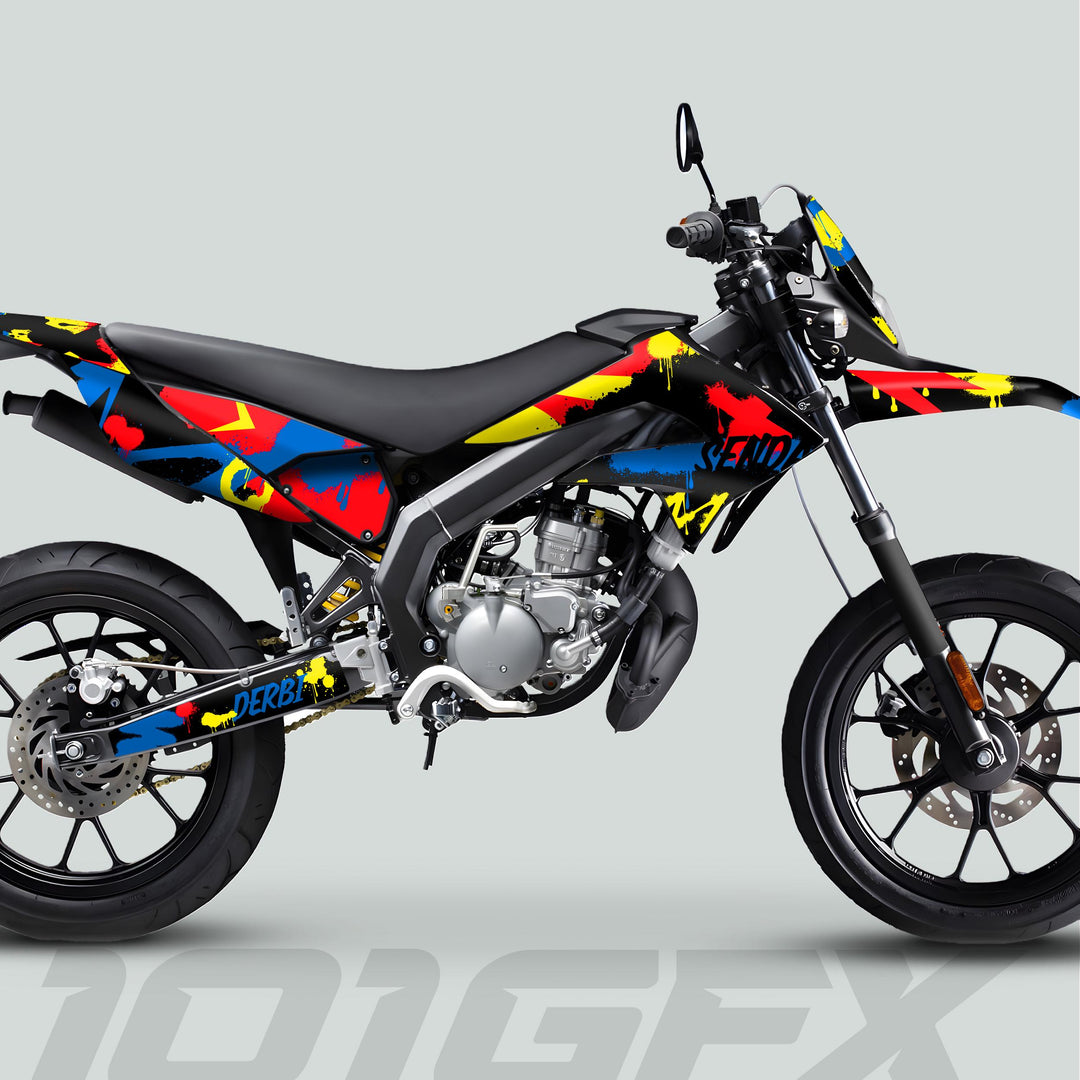 Derbi Senda Graphics Kit X-Treme 2011-2017 SPLASH BLUE RED on supermoto motorcycle, showcasing vibrant custom decals against a backdrop, enhancing aesthetic and protection.