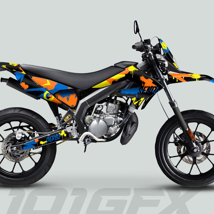 Derbi Senda Graphics Kit X-Treme 2011-2017 SPLASH BLUE ORANGE on a supermoto motorcycle, showcasing a vibrant graffiti-inspired wrap with road wheels and disc brakes.