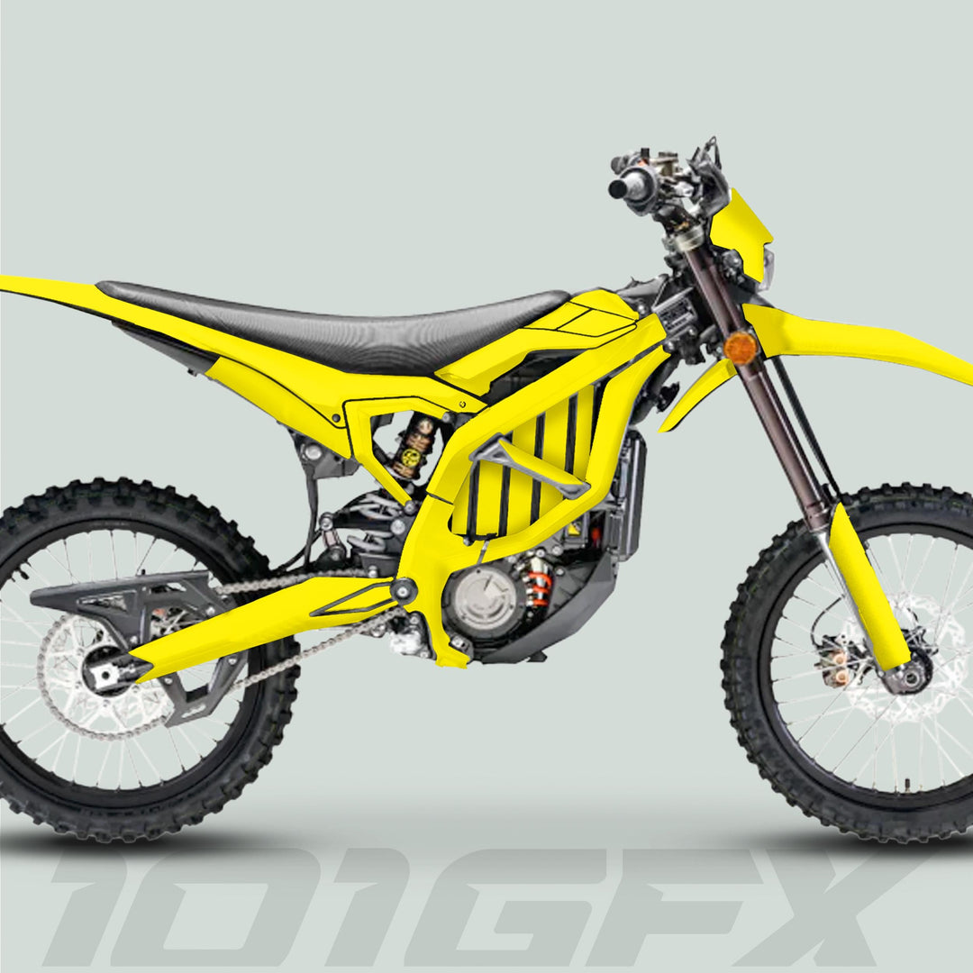 Side-view of a dirt bike fitted with the Surron Ultra Bee Graphics Kit Solid Color Yellow, showcasing durable, precision-fit vinyl for enhanced aesthetics and protection.