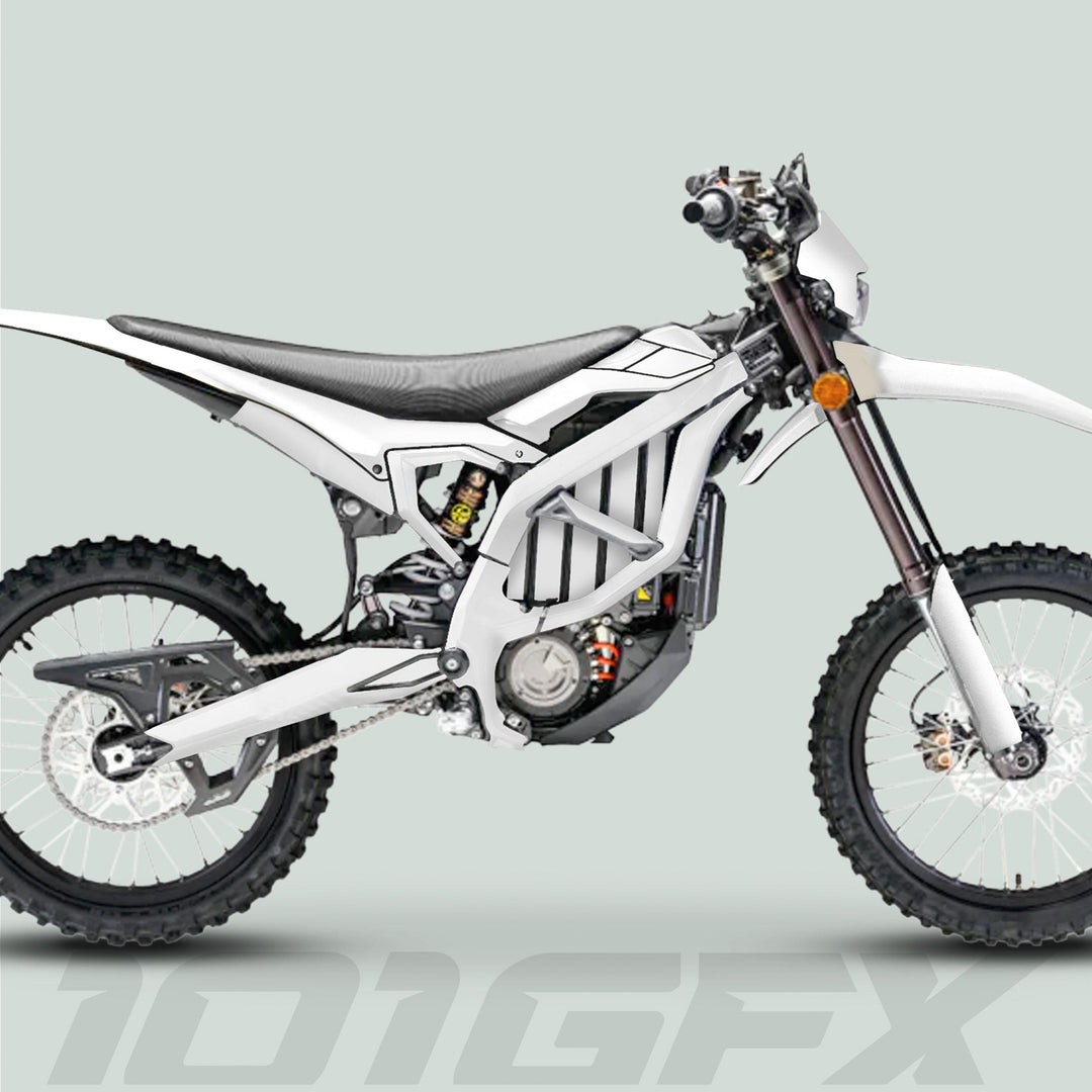 Side-view of a white Surron Ultra Bee Graphics Kit, featuring knobby wheels, tubular frame, and 10GFX model, highlighting sleek design and durable protection.