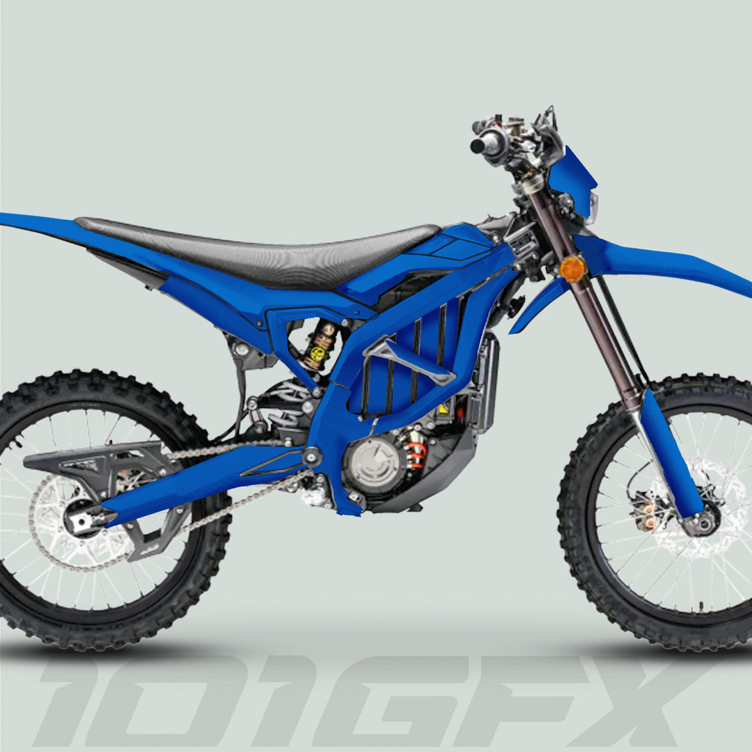 Surron Ultra Bee Graphics Kit SOLID COLOR BLUE on an electric dirt bike, showcasing a blue tubular frame, knobby tires, and sleek decals for a personalized look.