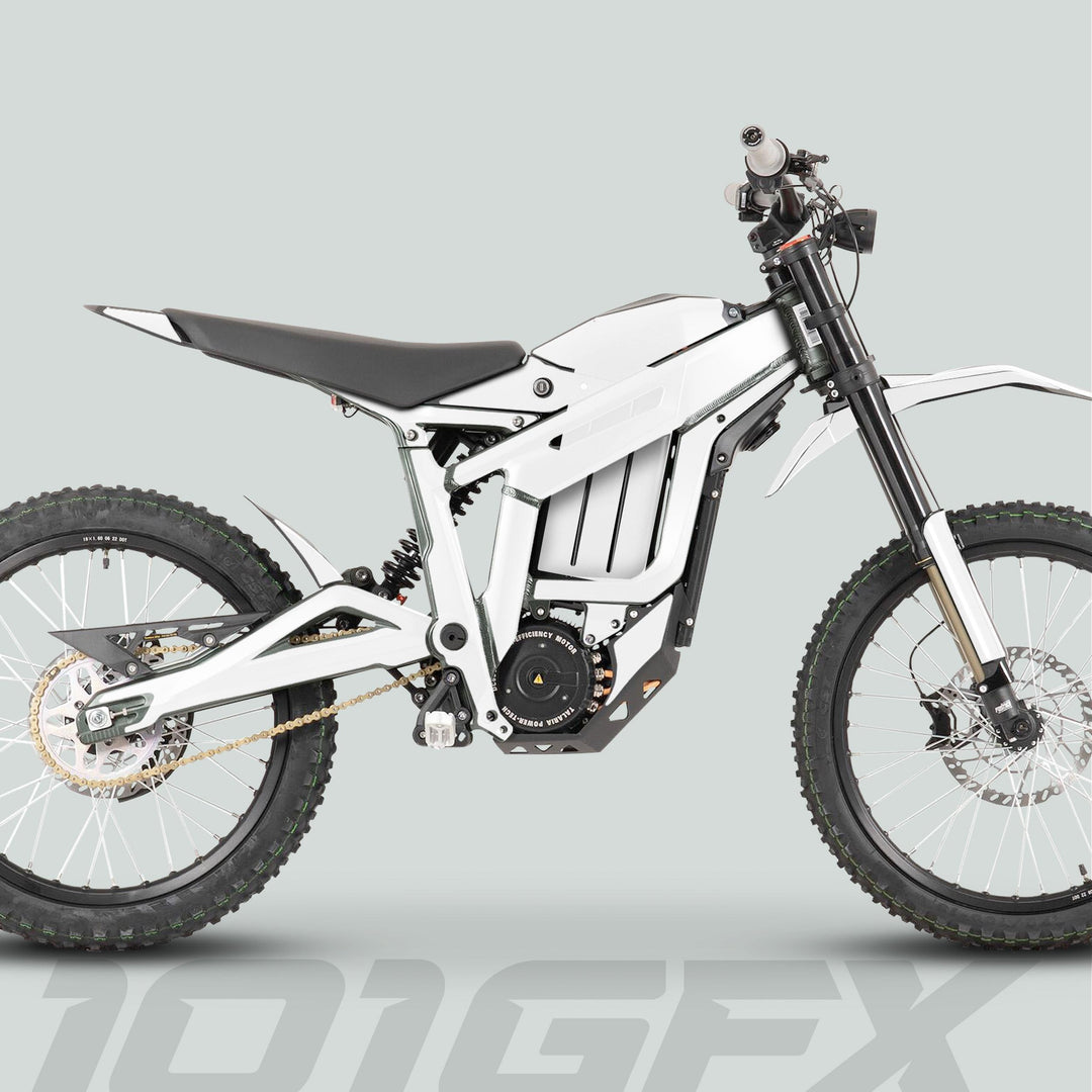 Side-profile of a white electric dirt bike featuring the Talaria Sting MX3 MX4 Graphics Kit SOLID COLOR WHITE, highlighting knobby tires, inverted forks, and high-mounted battery.