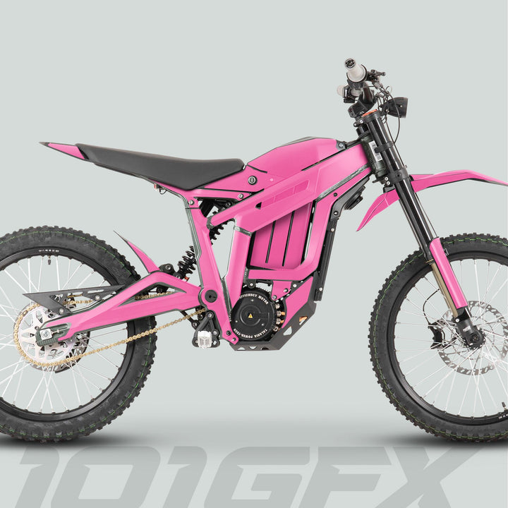 Side-view of a bright pink Talaria Sting MX3 MX4 Graphics Kit, featuring knobby tires, disc brakes, suspension, and mid-frame battery, enhancing bike's custom aesthetic.