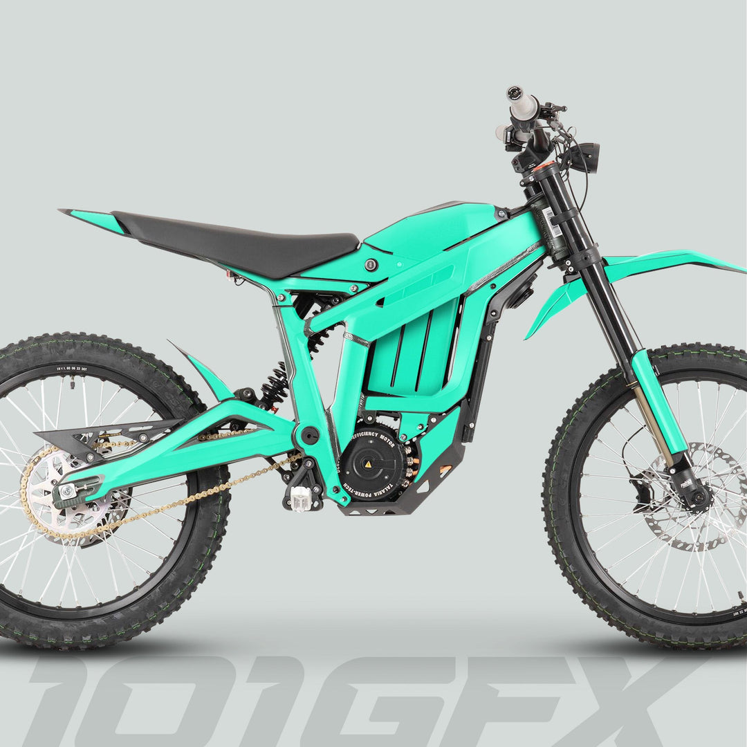 Talaria Sting MX3 MX4 Graphics Kit SOLID COLOR MINT on a turquoise-green electric off-road motorcycle, highlighting its battery compartment, suspension, off-road tires, and chain drive.
