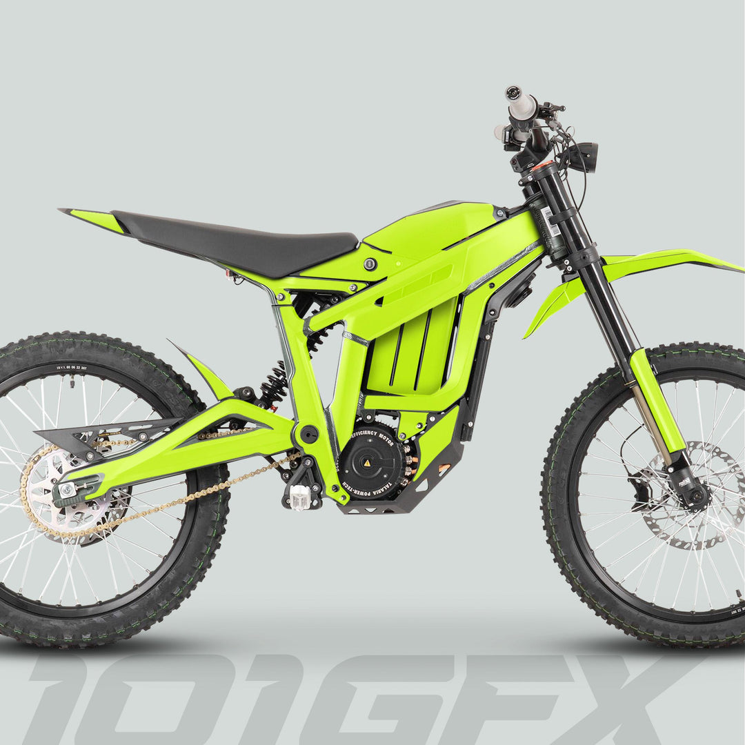 Side-view of an e-dirt bike with Talaria Sting MX3 MX4 Graphics Kit SOLID COLOR GREEN, featuring a vibrant green frame, knobby tires, and central battery assembly.