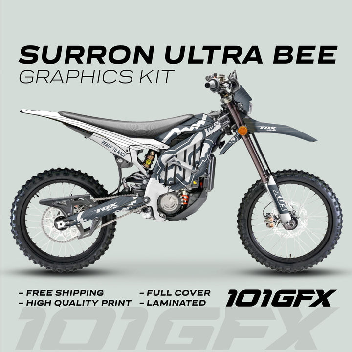 Surron Ultra Bee Graphics Kit FOX STRIPES Grey White on electric off-road bike, showcasing full-coverage, laminated decals with vibrant, durable design, emphasizing easy application and weather resistance.