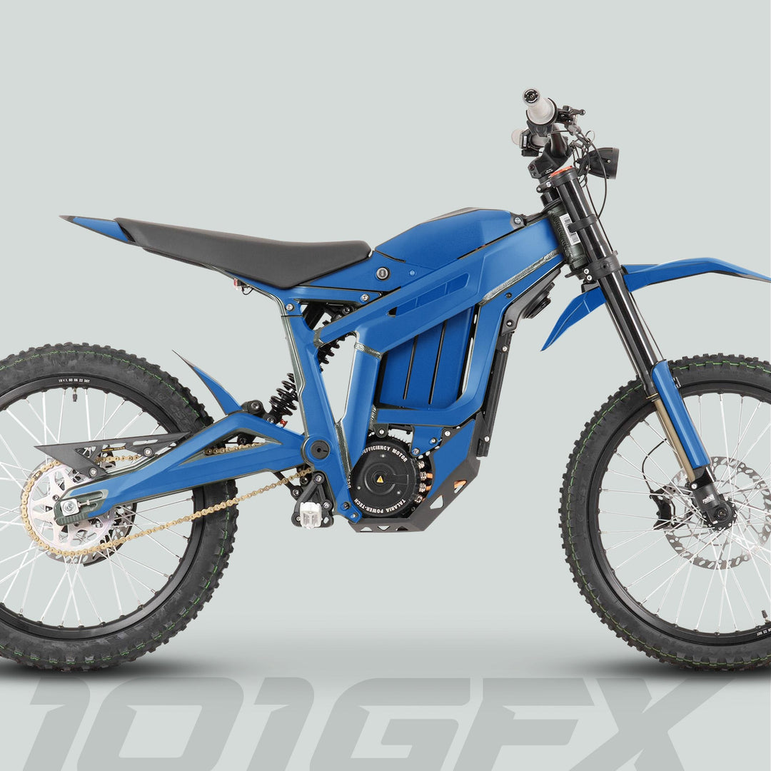Side-profile of a blue Talaria Sting MX3 MX4 electric dirt bike with full suspension, knobby tires, and minimalist bodywork showcasing the Solid Color Blue graphics kit.