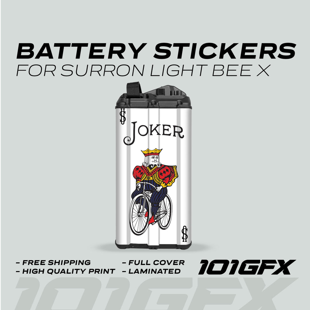 Surron Light Bee X Battery Stickers JOCKER featuring a joker graphic on battery, highlighting free shipping, high-quality print, full cover, laminated finish, 101GFX branding.