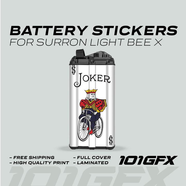 Surron Light Bee X Battery Stickers JOCKER featuring a joker graphic on battery, highlighting free shipping, high-quality print, full cover, laminated finish, 101GFX branding.