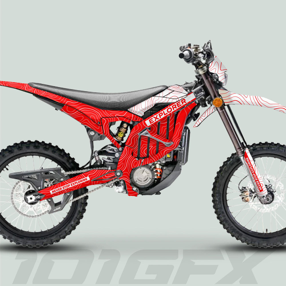 Surron Ultra Bee Graphics Kit EXPLORER RED WHITE on a dirt bike, featuring a topographic map design and NEVER STOP EXPLORING text on swingarm and fork guards.
