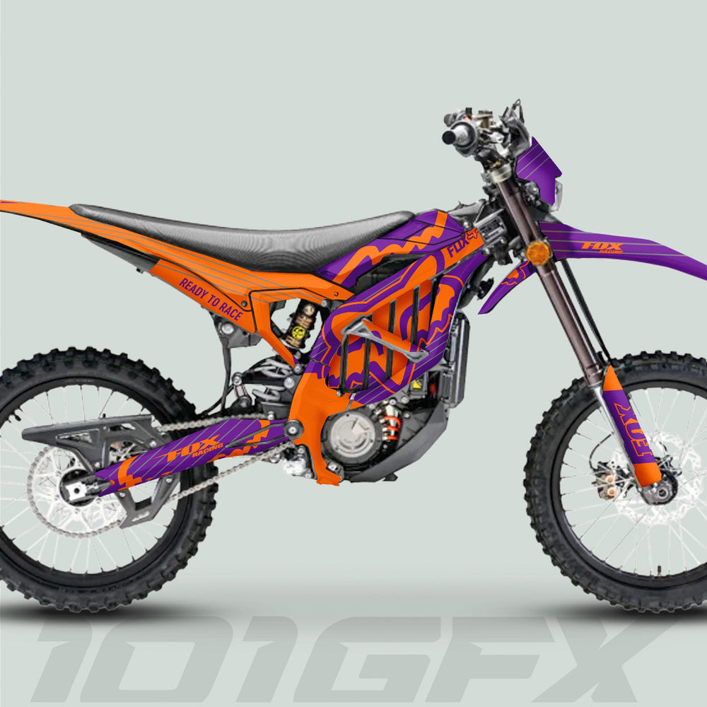 Surron Ultra Bee Graphics Kit FOX STRIPES Purple Orange on motocross bike, featuring knobbly tires, orange frame, and Ready to Race slogan.