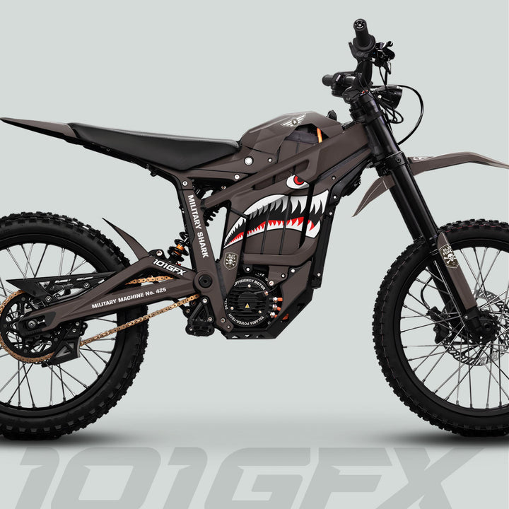 Talaria Sting MX5 PRO Graphics Kit MILITARY SHARK Earth Decals with shark-mouth graphic, knobby tires, and rugged frame, enhancing off-road bike's style and durability.