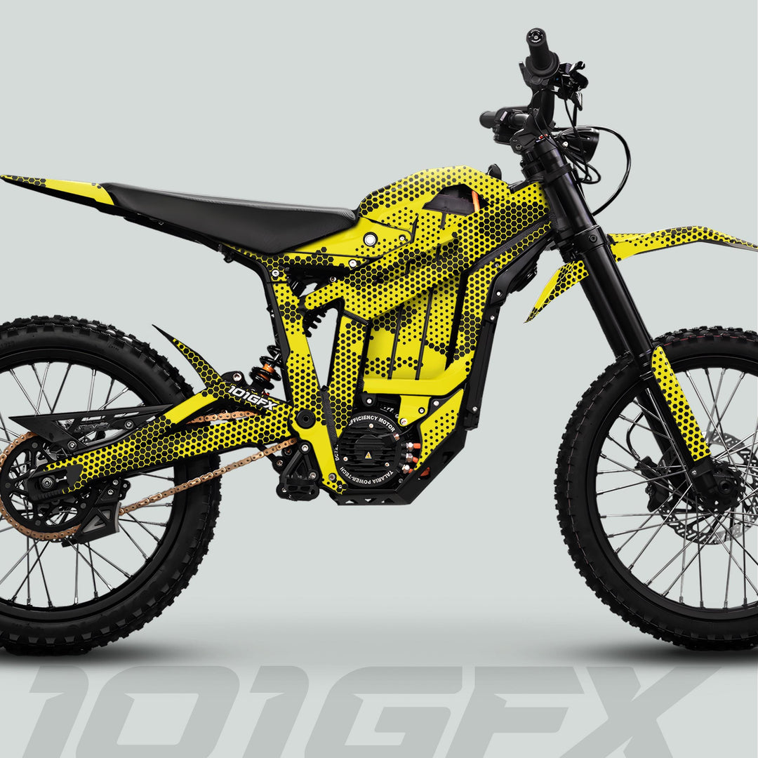Talaria Sting MX5 PRO Graphics Kit HEXOCAM YELLOW Decals on electric dirt bike, featuring a vibrant, perforated-hex design, enhancing style and durability for adventurous rides.